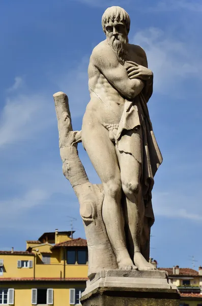 Standbeeld van de winter, brug st. trinita, florence — Stockfoto