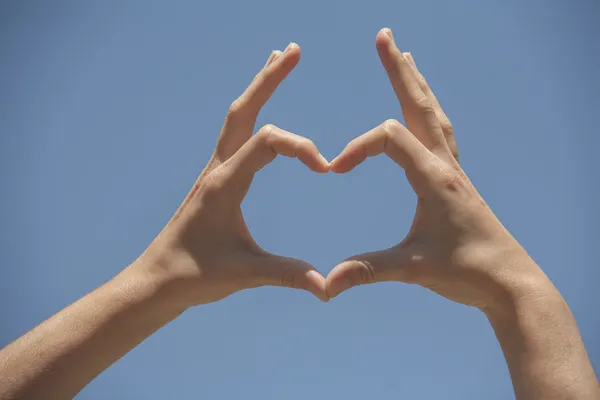 Hands in the shape of heart — Stock Photo, Image