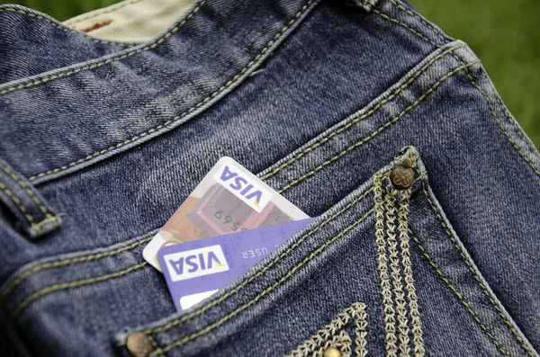 Credit and jeans. — Stock Photo, Image