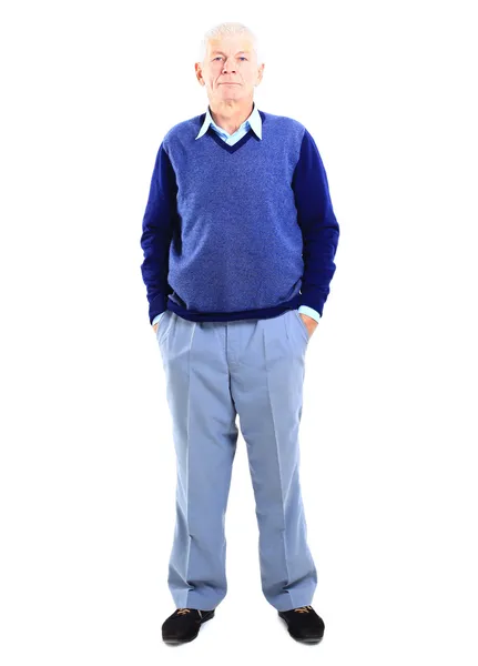 Full length of a happy senior man standing confidently on white background — ストック写真