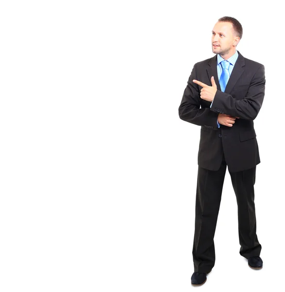 Pleine longueur de jeune homme d'affaires pointant vers l'espace de copie isolé sur fond blanc — Photo