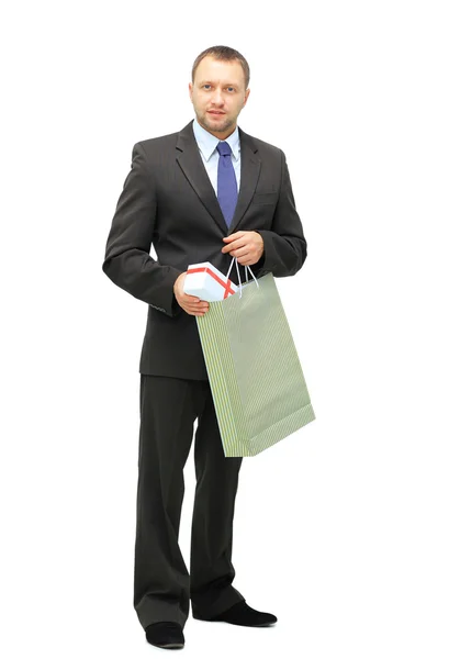 Ευτυχισμένος ψώνια άνθρωπος. απομονωθεί σε λευκό φόντο — Φωτογραφία Αρχείου