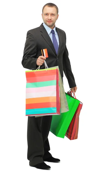 Feliz homem das compras. Isolado sobre fundo branco — Fotografia de Stock