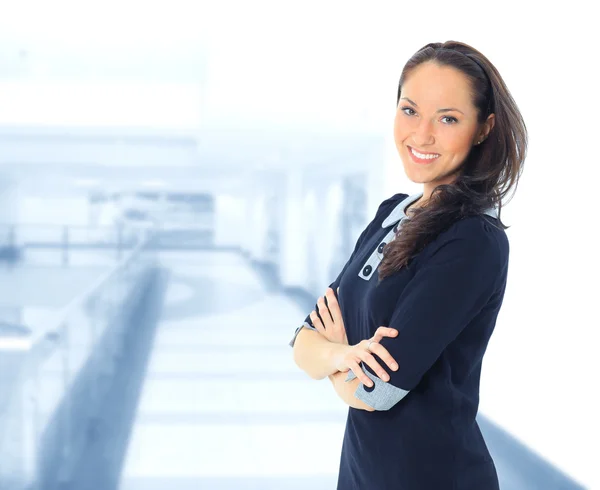 A portrait of a young business woman in an office — Stock Photo, Image