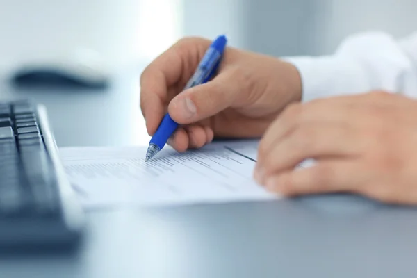 Hands writing on a paper — Stock Photo, Image