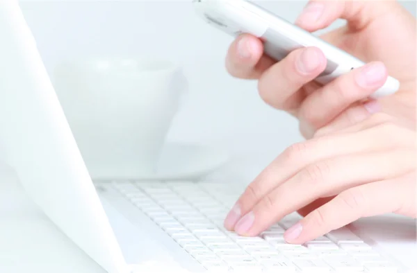 Human hands working on laptop on office background — Stock Photo, Image