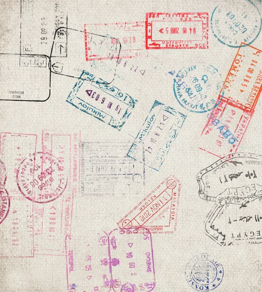 Fond de voyage avec différents timbres de passeport — Photo