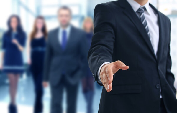 A business man with an open hand ready to seal a deal — Stock Photo, Image