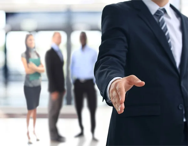 A business man with an open hand ready to seal a deal — Stock Photo, Image