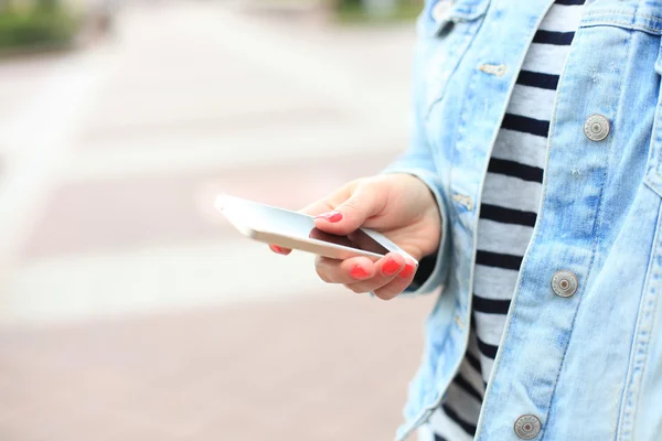 Close up of a woman using mobile smart phone — Stock Photo, Image