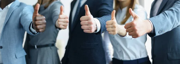 Cropped Shot Group Businesspeople Standing Office Showing Thumb — Stockfoto