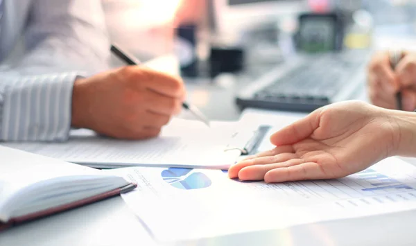 Unrecognizable Business Person Analyzing Graphs Taking Notes — Stock Photo, Image