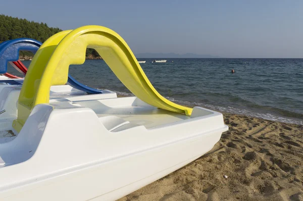 Plastic boat near by the seashore — Stock Photo, Image