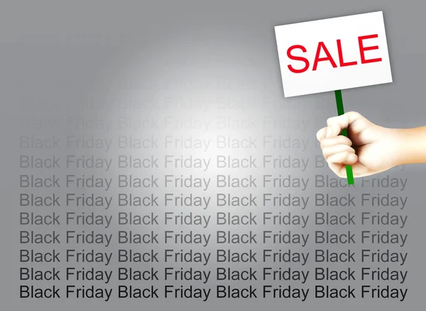 Main tenant une plaque de vente de texte sur fond Black Friday — Photo