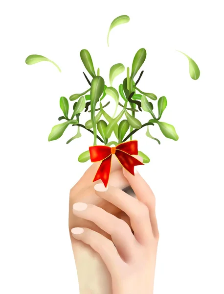 Hand Hoding Green Mistletoe with A Red Bow — Stock Photo, Image