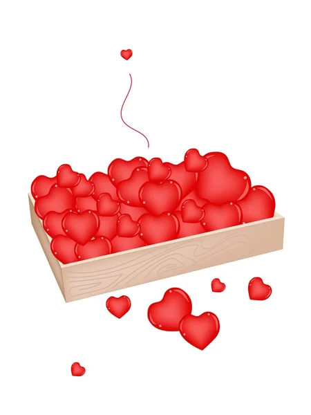 Pequeños corazones encantadores en un contenedor de madera — Archivo Imágenes Vectoriales