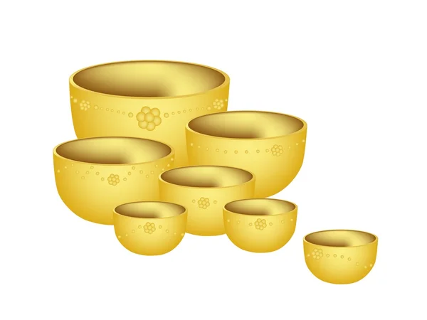 Eine Reihe goldener Schalen auf weißem Hintergrund — Stockvektor
