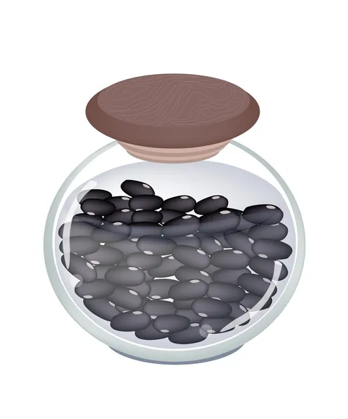 Un vaso di vetro di fagioli neri conservati — Vettoriale Stock
