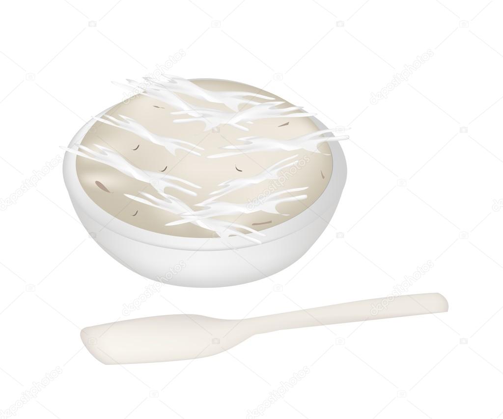 Thai Dessert of Banana Pudding with A Spoon