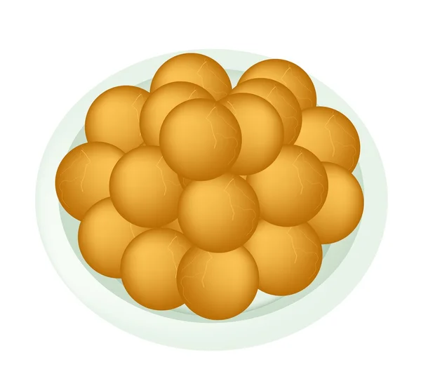 Un plato de bolas fritas de patata dulce — Vector de stock