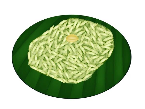 Arroz pegajoso verde dulce en hoja de plátano — Vector de stock