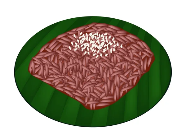 Tatlı kırmızı yapışkan pirinç muz yaprağı üzerinde — Stok Vektör