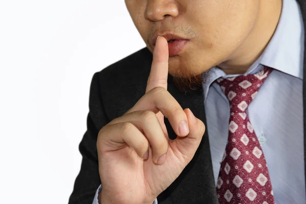 Male businessman finger mouth shh gesture — Stock Photo, Image