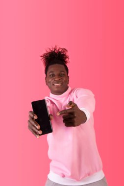 Excited afro american man pointing his smartphone with joy and confidence