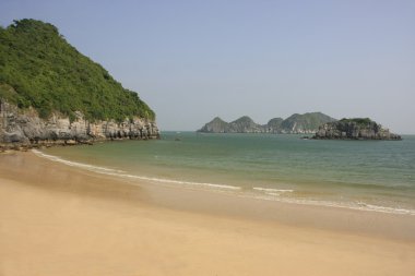 Beautiful empty beach, Cat Ba island, Halong Bay, Vietnam clipart