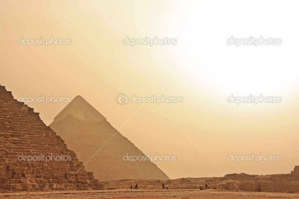 Great Pyramids of Giza in a sand strom, Cairo