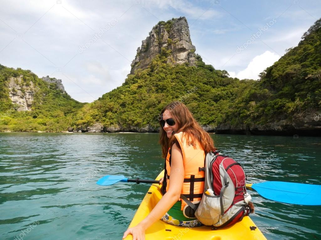 Young woman kayaking in Ang Thong National Marine Park, Thailand