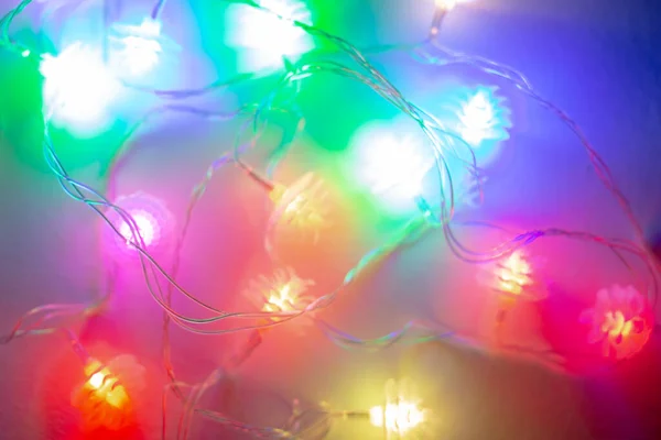 Fundo Grinaldas Festivas Natal Multi Coloridas Brilhando Escuro Noite — Fotografia de Stock