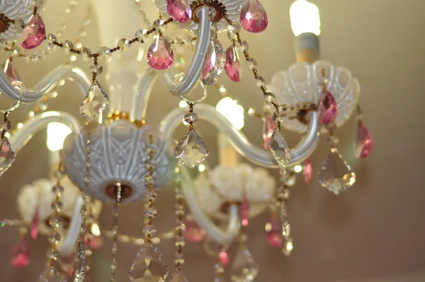 Crystal chandelier in white and pink colors — Stock Photo, Image