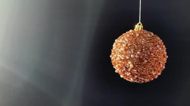 Nice Golden Glitter Christmas Ball Moves Black Background Shiny Christmas — Stock Video