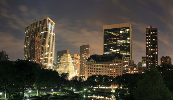 Central Park at night with Manhattan buildings in view. Taken in New York City.