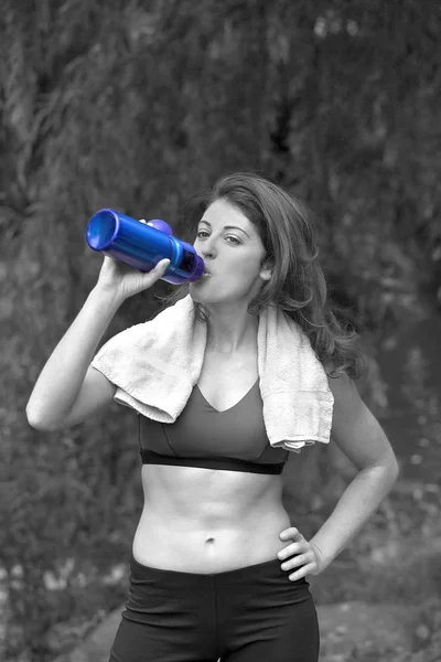 Girl drinking after workout — Stock Photo, Image