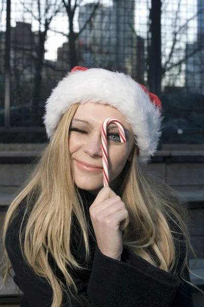 Girl with candy cane — Stok fotoğraf