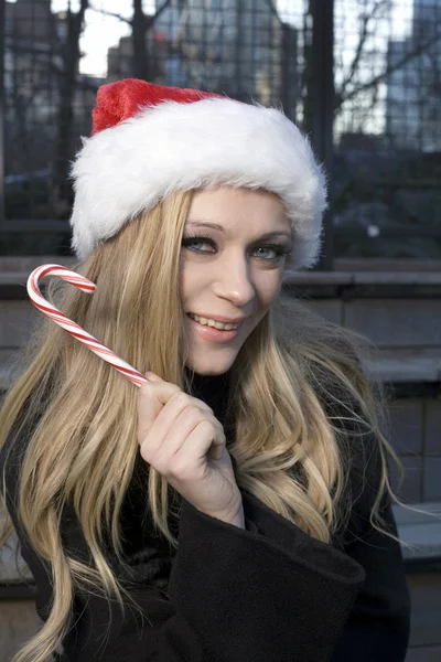 Girl with candy cane — Stock Photo, Image