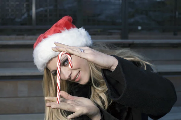 Girl with candy cane — Stock Photo, Image