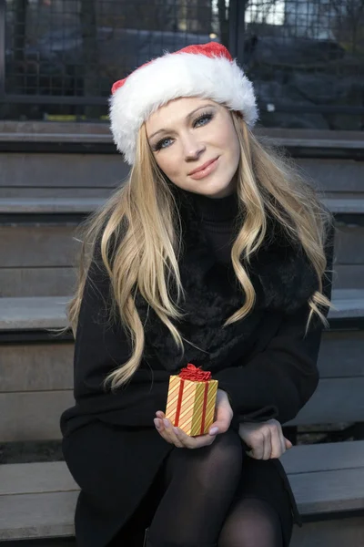 Girl with Christmas gift — Stock Photo, Image