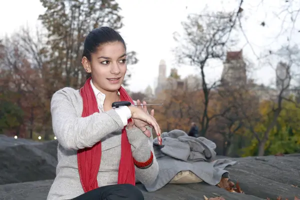 Girl with communication device — Stock Photo, Image