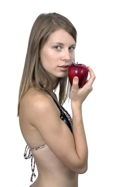 Girl holding apple — Stock Photo, Image