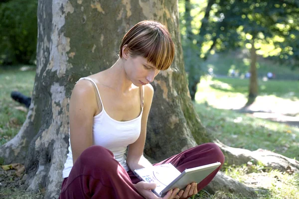 Woman with electronic device — Stock Photo, Image