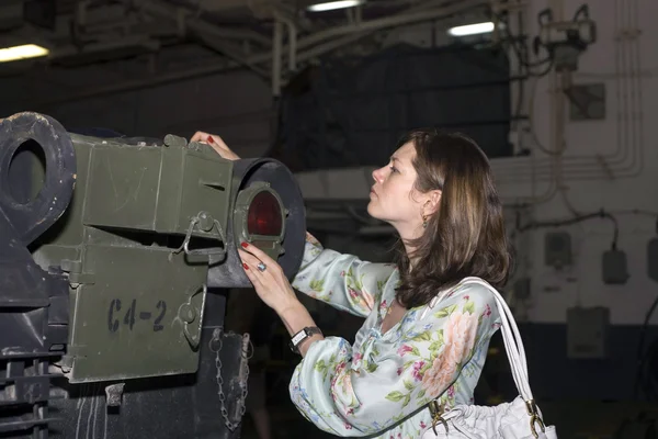 Girl with military vehicle — Stock Photo, Image