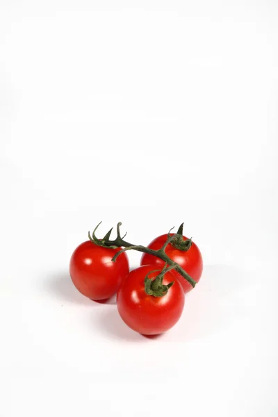 Cherry tomatoes on white background — Stock Photo, Image