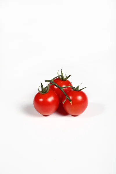 Cherry tomatoes on white — Stock Photo, Image