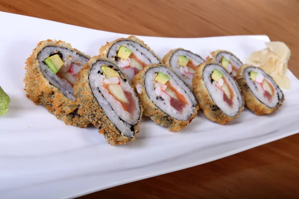 Sushi on rectangular plate — Stock Photo, Image