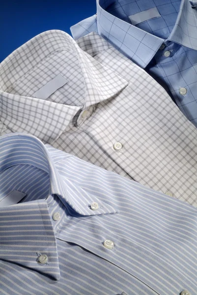Три рубашки для мужчин — стоковое фото