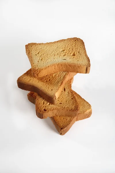 Four slices toast viewed from above on white — Stock Photo, Image