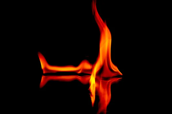 Fire flames in black background — Stock Photo, Image